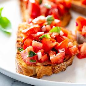 Bruschetta- sliced french bread with tomato mix on top